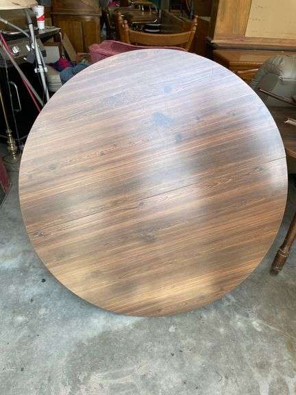 round table with 2 leafs and pedal stool base