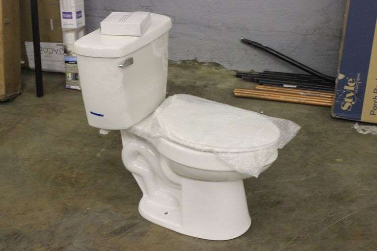 AquaSource Toilet 1.28/gpf - Matthews Auctioneers