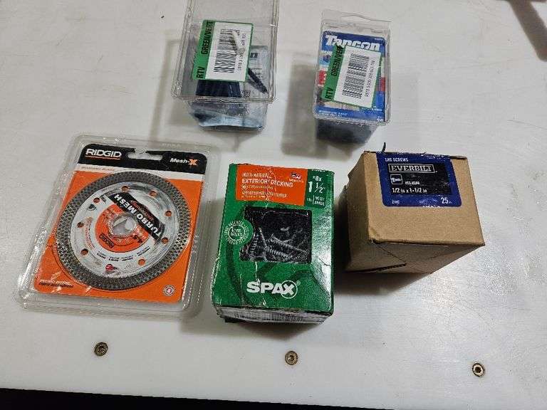 Lot of misc screws and diamond blade