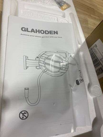 Retractable Water Hose - Matthews Auctioneers