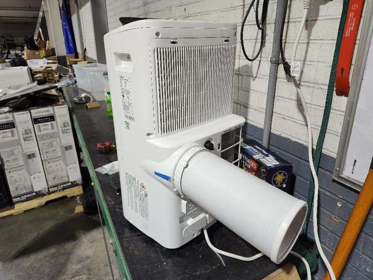 6,000 (DOE) BTU Portable Air Conditioner Cools 250 Sq. Ft. With Dehumidifier and Remote Control in White
