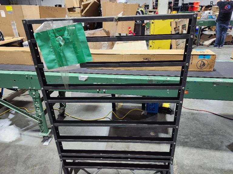 Textile fabric display rack with wheels