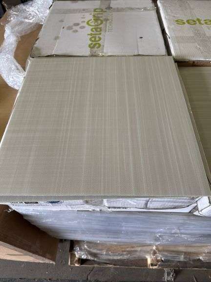 Box of peel and stick vinyl 18" by 18" square opal white flooring tiles (36 sq. Ft. Per box)