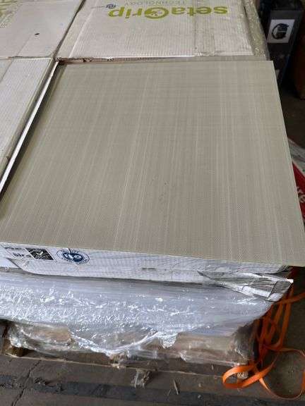Box of peel and stick vinyl 18" by 18" square opal white flooring tiles (36 sq. Ft. Per box)
