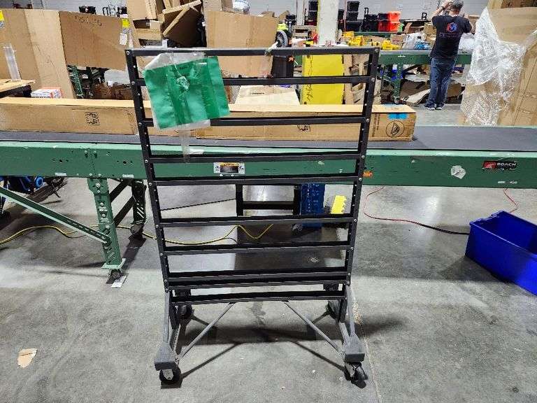 Textile fabric display rack with wheels