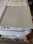 Box of peel and stick vinyl 18" by 18" square opal white flooring tiles (36 sq. Ft. Per box)
