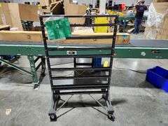 Textile fabric display rack with wheels