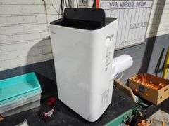 6,000 (DOE) BTU Portable Air Conditioner Cools 250 Sq. Ft. With Dehumidifier and Remote Control in White