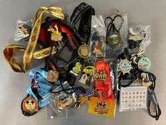 Group of Disney Enamel Pins and Lanyards