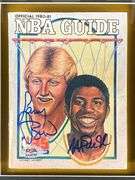 Framed Larry Bird and Magic Johnson Signed 1980 - 81 NBA Guide with PSA COA