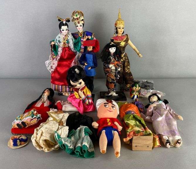 Group of Eastern Dolls and More - Matthew Bullock Auctioneers