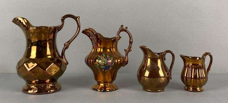 Group of 4 Copper Lusterware Stoneware Pitchers