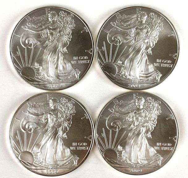 Group of 4 2009 American Silver Eagles