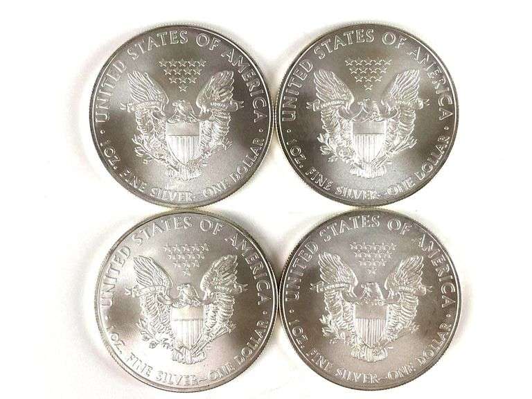 Group of 4 2009 American Silver Eagles