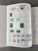 Traveler Stamp Album with Assorted Stamps