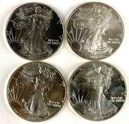 Group of 4 American Silver Eagles