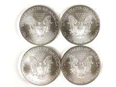 Group of 4 2009 American Silver Eagles