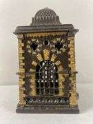 Antique J and E Stevens Cast Iron Roof Bank