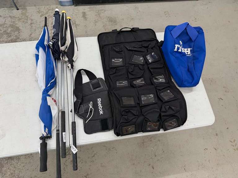 (2) Bags, (4) Umbrellas & Reebok Pad