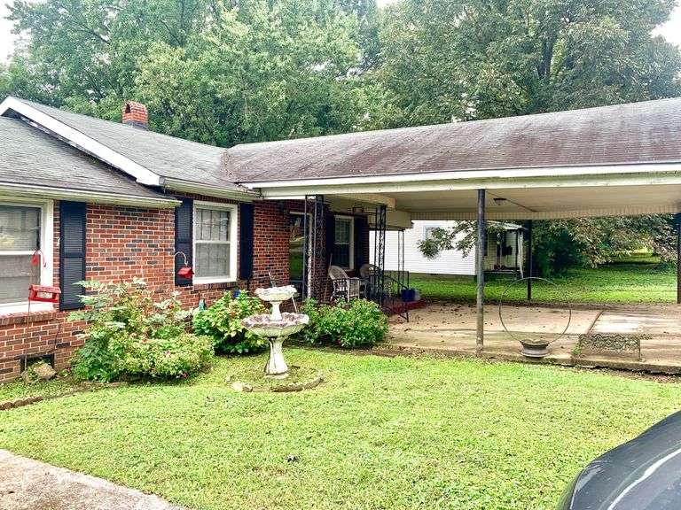 Full brick home w/apartment -Shop on large lot