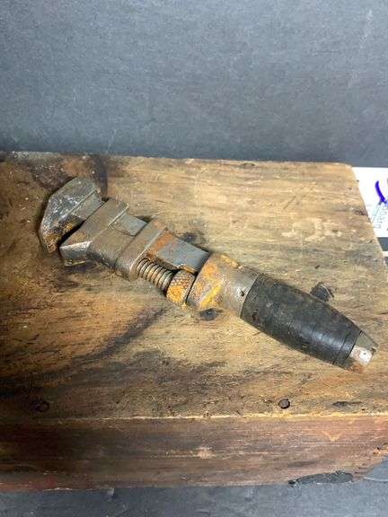 Early small slip jaw wood handle wrench