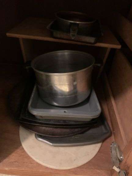 Contents of cabinet: Pizza pan/Biscuit pans and more