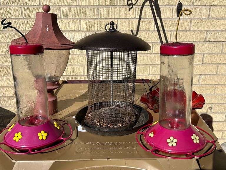 Lot Bird feeders and pole light McNatt Real Estate