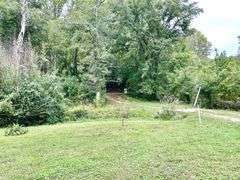 Tract 2 : Beautiful country home and 50+/-acres of peacefulness!