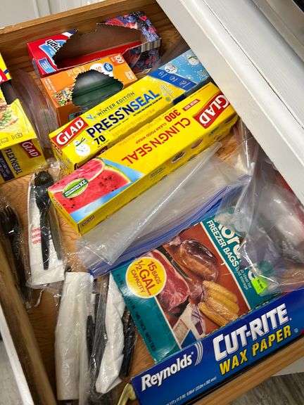 Contebts of cabinet and drawer- Baking pans -skillets -Blender- can opener and more