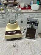 Contebts of cabinet and drawer- Baking pans -skillets -Blender- can opener and more