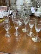 Etched glass pitcher and 6 stemmed glasses