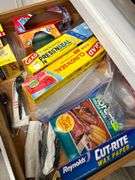 Contebts of cabinet and drawer- Baking pans -skillets -Blender- can opener and more