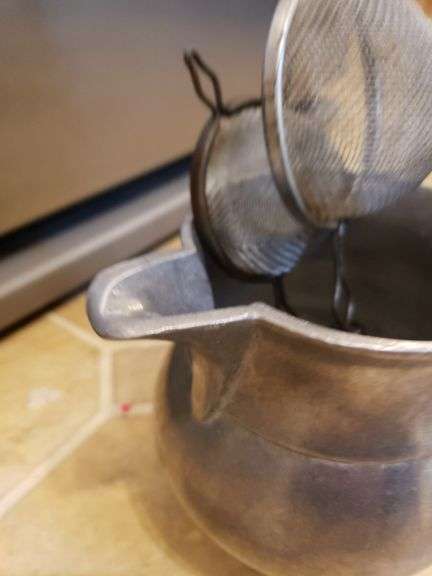 Nice aluminum pitcher with contents