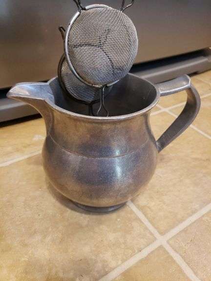 Nice aluminum pitcher with contents