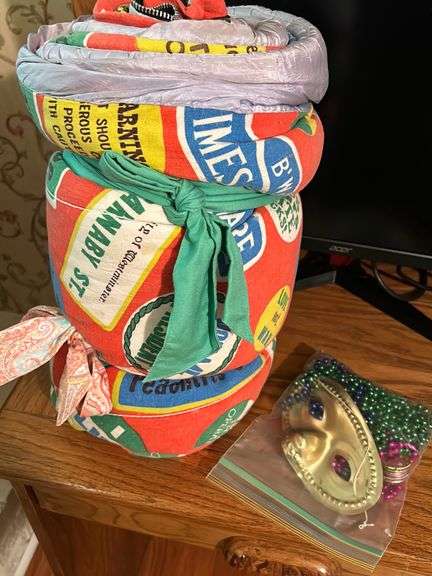 Vintage sleeping bag and Marti gra items