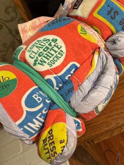 Vintage sleeping bag and Marti gra items