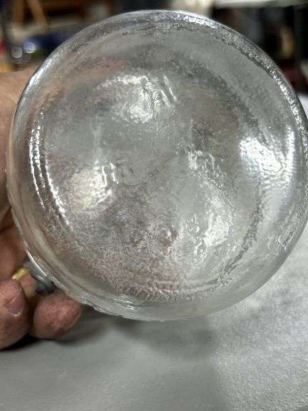Nice old glass top Atlas While fruit jar