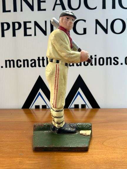 Cast iron baseball door stop