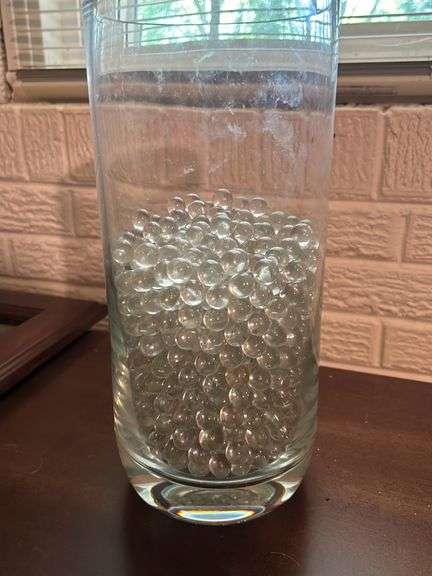 Large glass vase with lots of Marbles