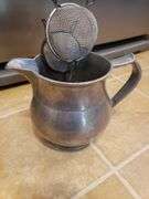 Nice aluminum pitcher with contents