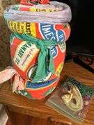 Vintage sleeping bag and Marti gra items