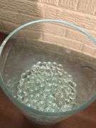 Large glass vase with lots of Marbles