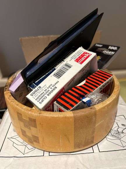 Wooden bowl with office supplies
