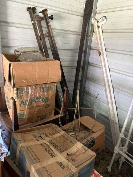 Tubs of misc and boxes of misc -pedestal table -wrought iron bed with rails -lamps-rugs