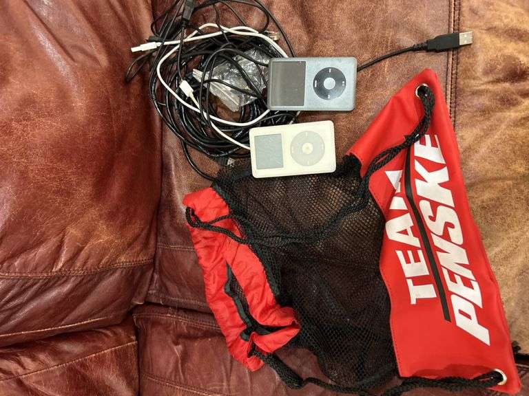 2 IPods -cables and bag -untested