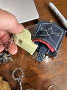 12 neat keychains done with adv