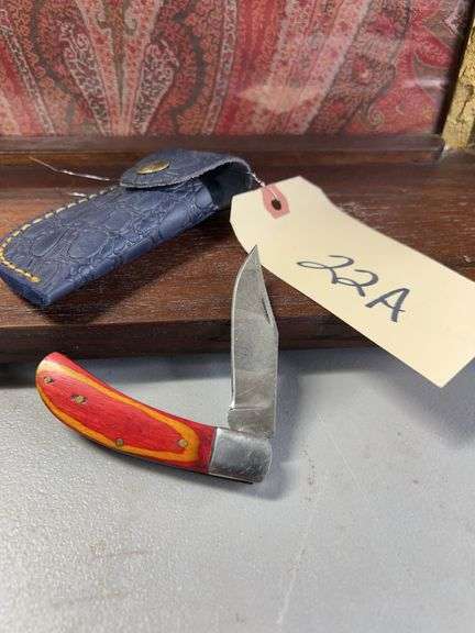 Damascus folding knife with sheath