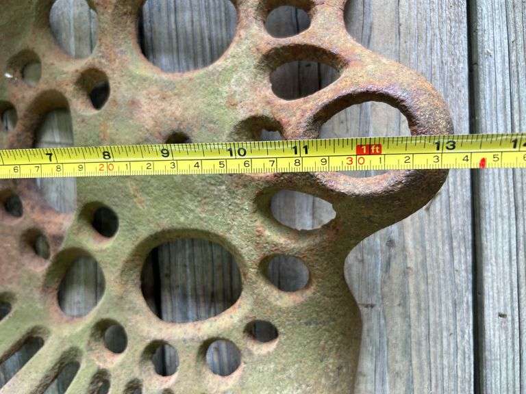 Cast iron implement seat