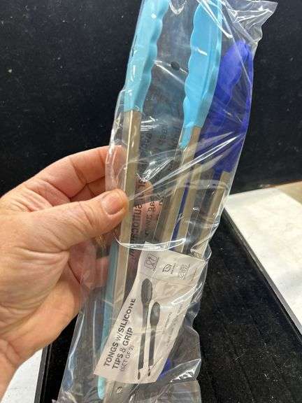 Pair of new Tongs with silicone tips and grips