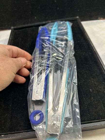 Pair of new Tongs with silicone tips and grips